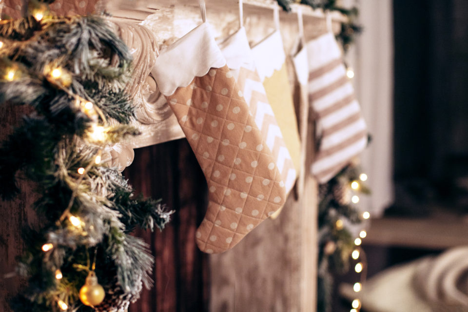 Christmas stockings hanging over fireplace