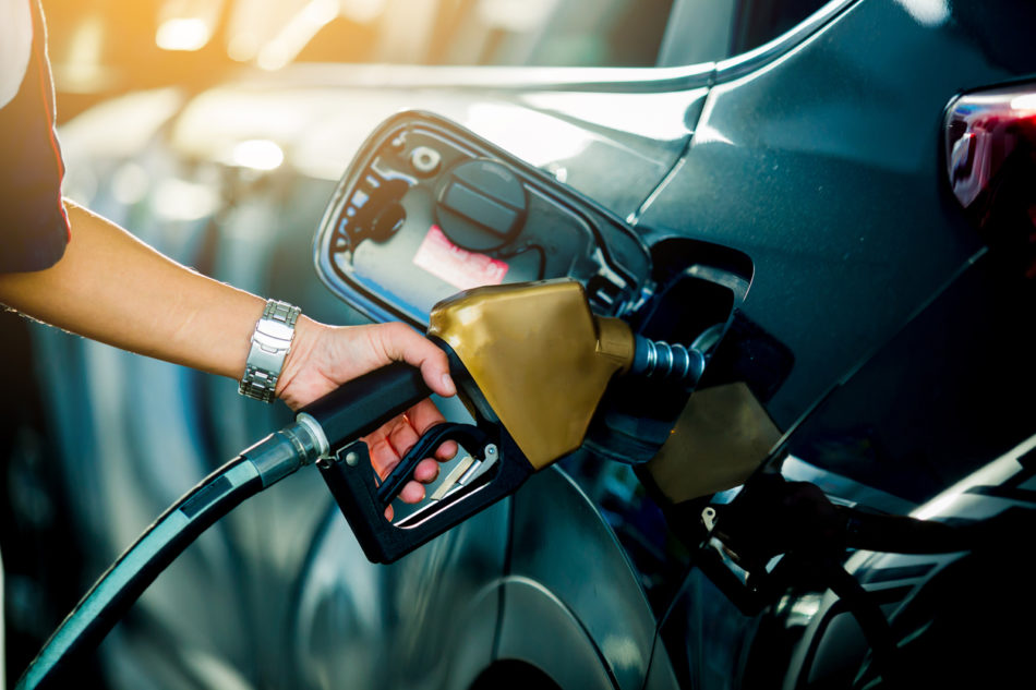 Hand pumping gas