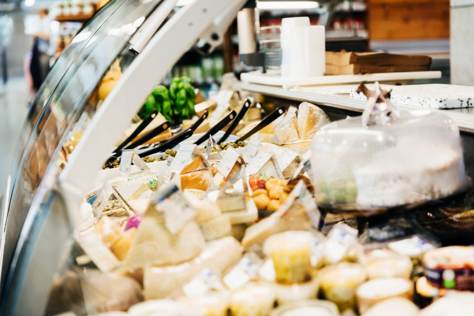 Close Up Of Cheese Counter At Supermarket