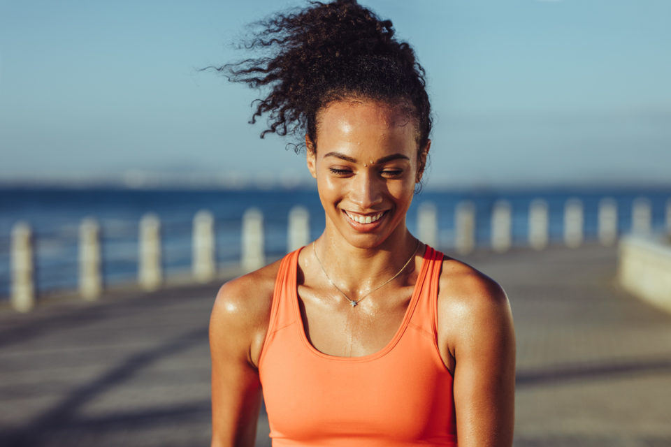 Sporty woman taking a break while exercising