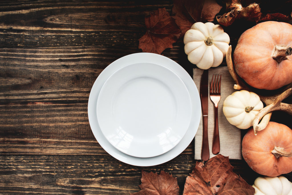 Fall tablescape with pumpkins and leaves